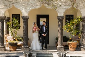 Romantic intimate wedding ceremony in San Miguel de Allende featuring personalized floral design, neutral tones, and elegant colonial architecture.